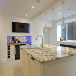 The Tannochbrae Fully Equipped Modern Kitchen, with Smart TV and Refreshments Fridge. Marble Topped, with Bar Stools